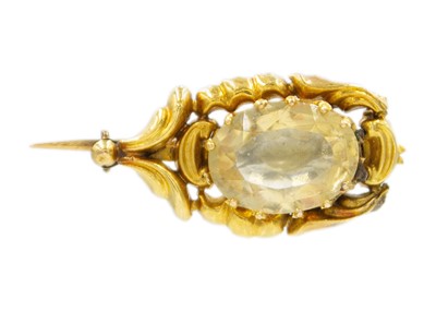 Lot 4 - A Victorian high-purity citrine set brooch.