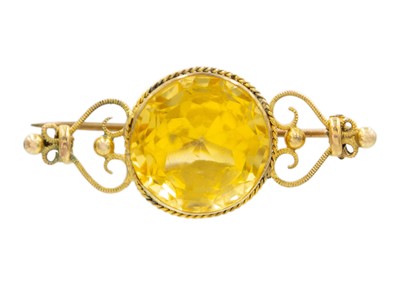 Lot 5 - A Victorian high-purity gold paste set brooch.
