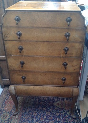 Lot 3101 - A figured walnut chest on stand,1930s, by...