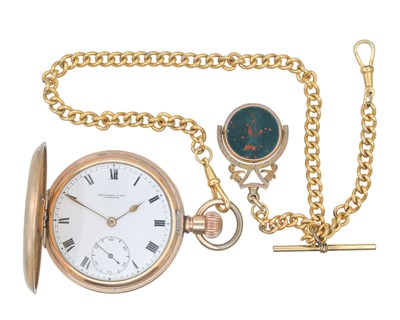 Lot 1128 - A full hunter gold-plated keyless wind pocket watch with rolled gold Albert and 9ct fob.