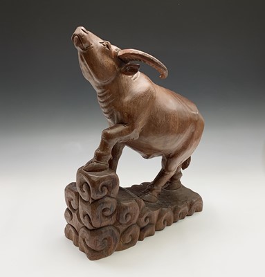 Lot 260 - A large carved wood model of a water buffalo,...