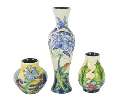 Lot 238 - Three Moorcroft vases in different forms.