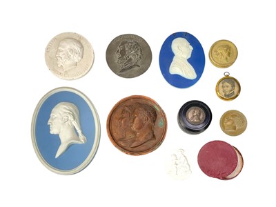 Lot 28 - A 19th century miniature portrait printed on silk.