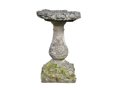 Lot 378 - A composition stone bird bath.