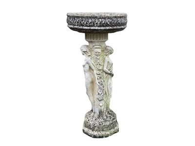 Lot 381 - A reconstituted stone bird bath.