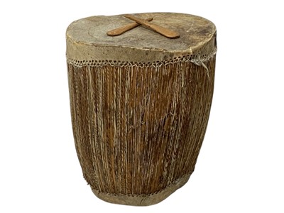 Lot 87 - A large African tribal double-ended drum.