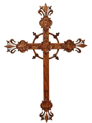 Lot 111 - A French carved oak wall mounted cross of fleur de lis form.