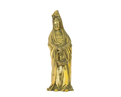 Lot 792 - A Chinese polished brass figure of Guanyin.