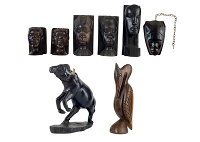 Lot 79 - Two pairs of African carved hardwood bookends.
