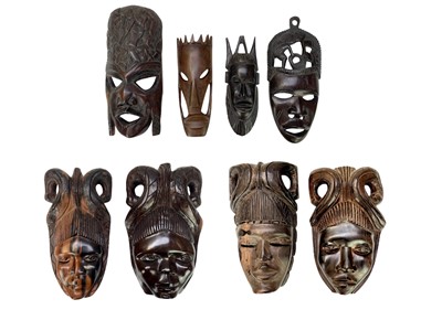 Lot 5 - Eight African carved hardwood masks.