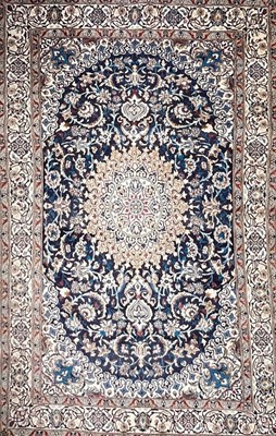 Lot 613 - A Persian handknotted Nain carpet.