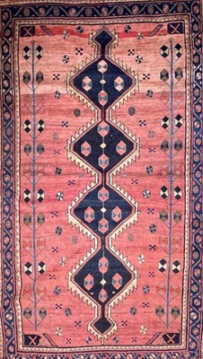Lot 625 - A Persian Navahand carpet.