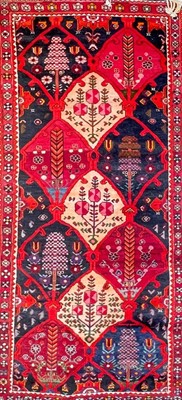Lot 633 - A Persian Bakhtiar carpet.