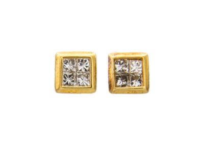 Lot 68 - A pair of 18k gold diamond stud earrings, boxed.