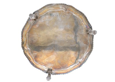 Lot 8 - A George II silver waiter by John Cafe.
