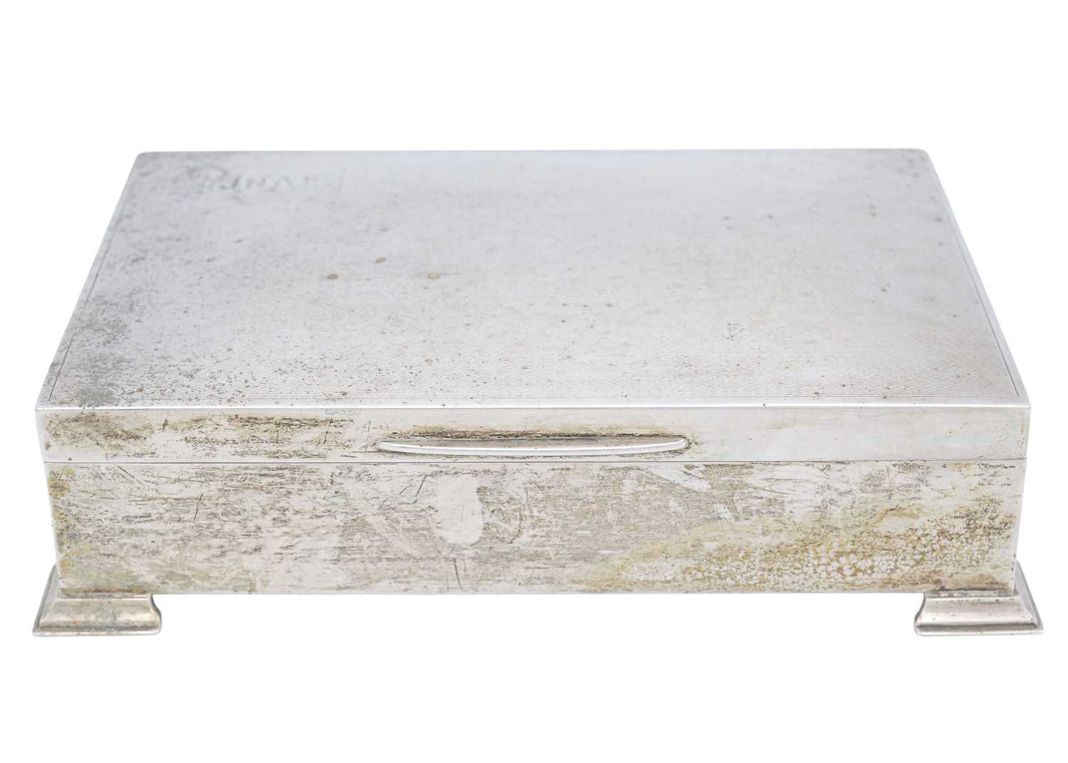 Lot 9 - An early 20th-century sterling silver engine turned cigarette box.