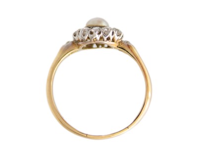 Lot 17 - A high purity gold pearl and diamond cluster ring.