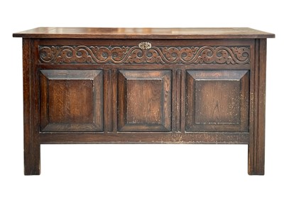 Lot 516 - An oak panel coffer.