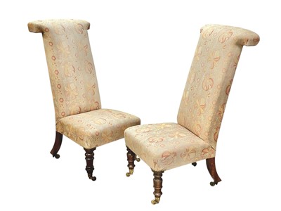 Lot 519 - A pair of late Victorian mahogany framed prie dieu chairs.