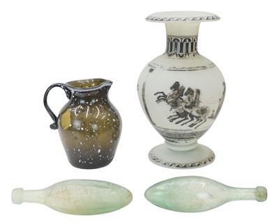 Lot 283 - An early 19th century Wrockwardine or Nailsea glass jug.