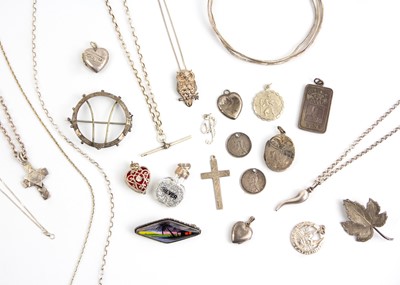 Lot 67 - A selection of silver pendant necklaces with other silver jewellery.