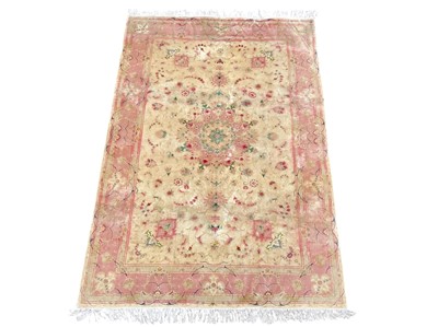 Lot 624 - A Persian rug.