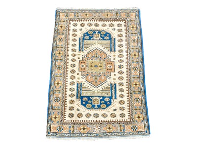 Lot 642 - A Turkish rug.