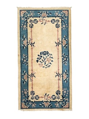 Lot 641 - A modern Chinese rug.