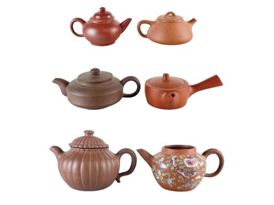 Lot 655 - Five Yixing pottery teapots.