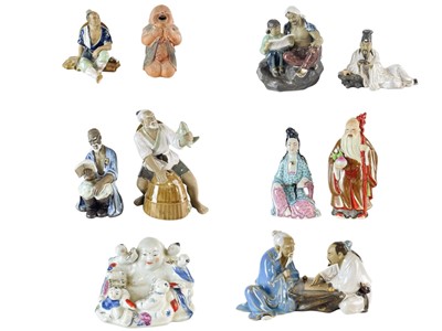 Lot 727 - A collection of eight Chinese Shiwan figures.