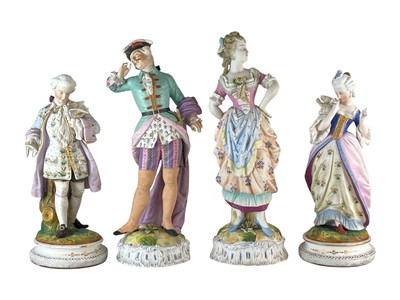 Lot 243 - A pair of 19th century French bisque porcelain figures.
