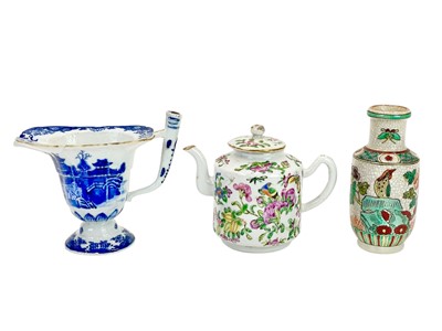 Lot 653 - A Chinese porcelain famille rose small teapot.