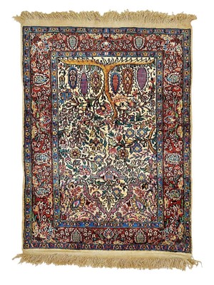 Lot 637 - A tree of life prayer rug.