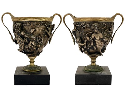 Lot 112 - A pair of grand tour gilt bronze and silvered urns or vases.