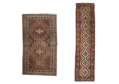 Lot 615 - A woolen runner and a woolen rug.