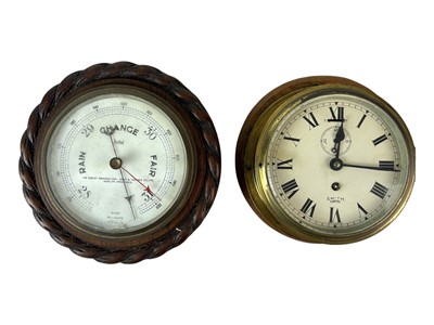 Lot 468 - A Smith Empire brass bulkhead timepiece.