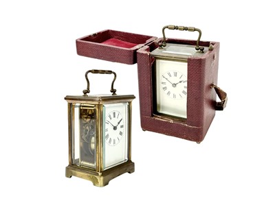 Lot 467 - A French brass carriage timepiece, with travel case.
