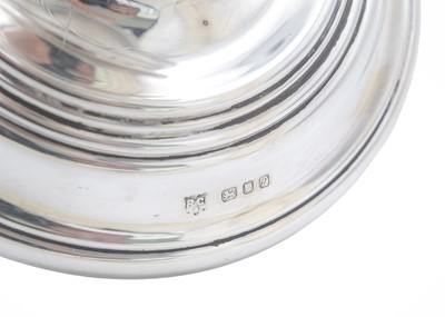 Lot 18 - A silver candlestick by William Comyns & Sons Ltd.