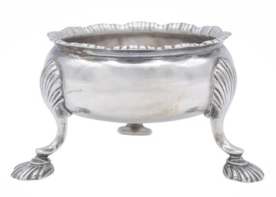 Lot 20 - A George III silver circular salt, together with two salt spoons.
