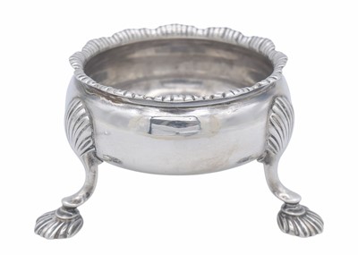Lot 20 - A George III silver circular salt, together with two salt spoons.