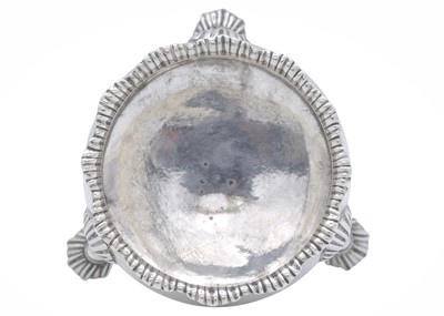 Lot 20 - A George III silver circular salt, together with two salt spoons.