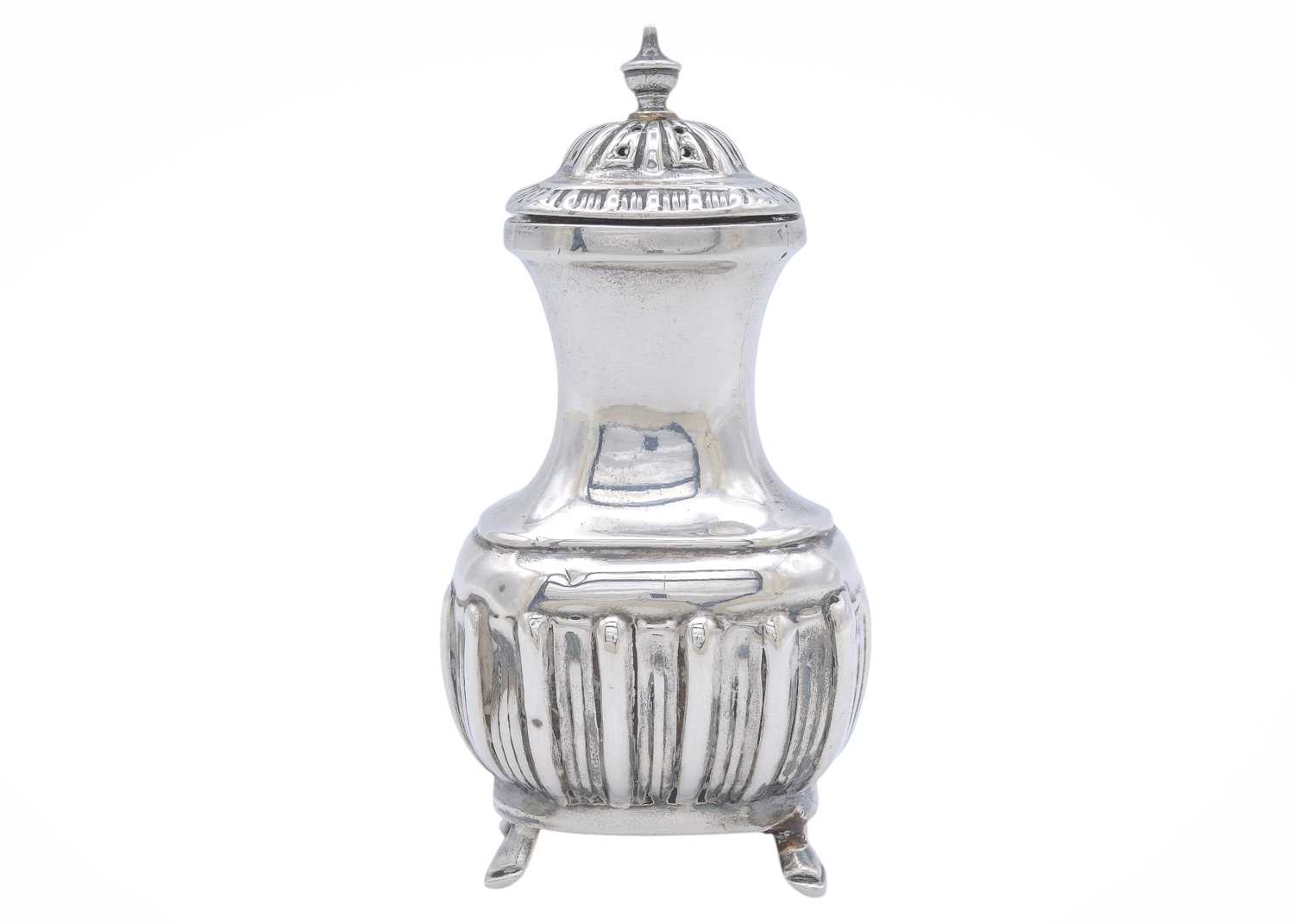 Lot 21 - A silver pepper caster.