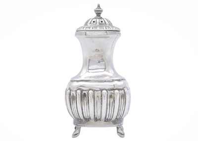 Lot 21 - A silver pepper caster.