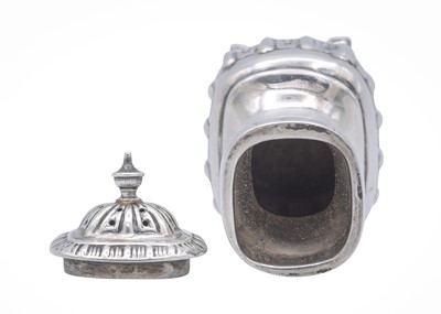 Lot 21 - A silver pepper caster.