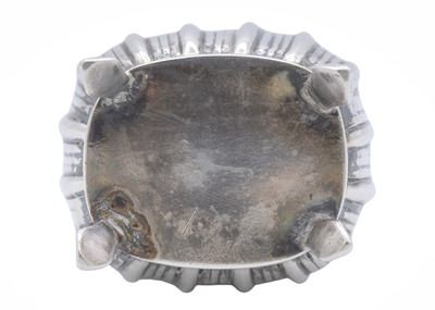 Lot 21 - A silver pepper caster.