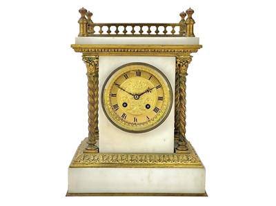 Lot 469 - A French white marble and gilt metal mantel clock.