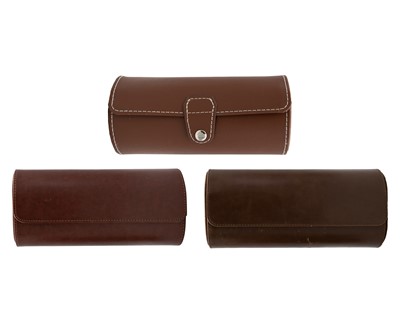 Lot 1207 - A selection of three brown leather three section wristwatch roll cases.