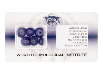 Lot 93 - A parcel of six loose oval cabochon sapphire stones.