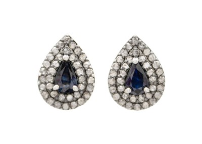 Lot 96 - A pair of gold-plated silver sapphire and diamond stud earrings.