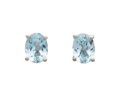 Lot 110 - A pair of silver blue topaz stud earrings.